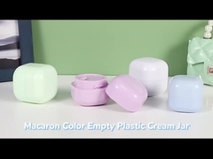 Containers en plastique vides de crème à la couleur des macarons